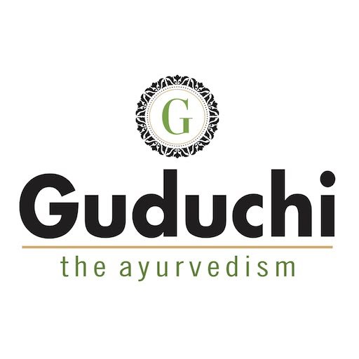 Guduchi The Ayurvedism logo with an ornate medallion monogram